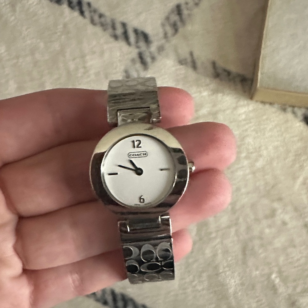 Woman’s coach stainless steel Swiss quartz watch🤍